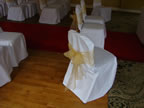 White Chair Cover with Gold Organza Sash